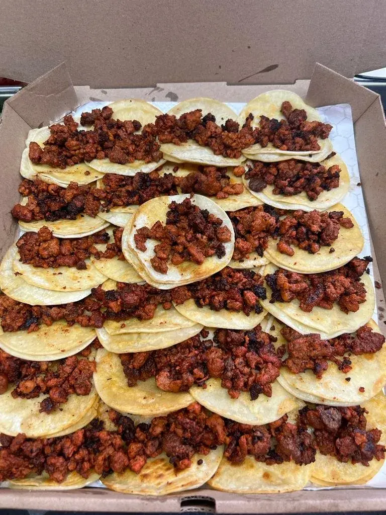 Taco box filled with al pastor tacos